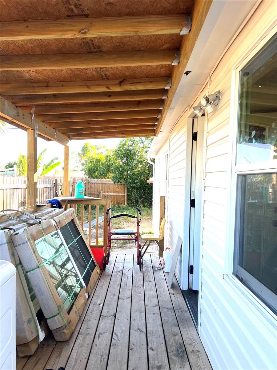 DECK AND ENTERANCE INTO DINING AREA