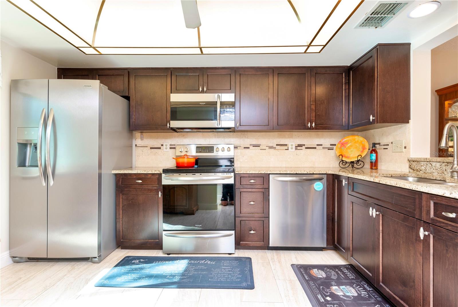 Kitchen with stainless steel appliances.