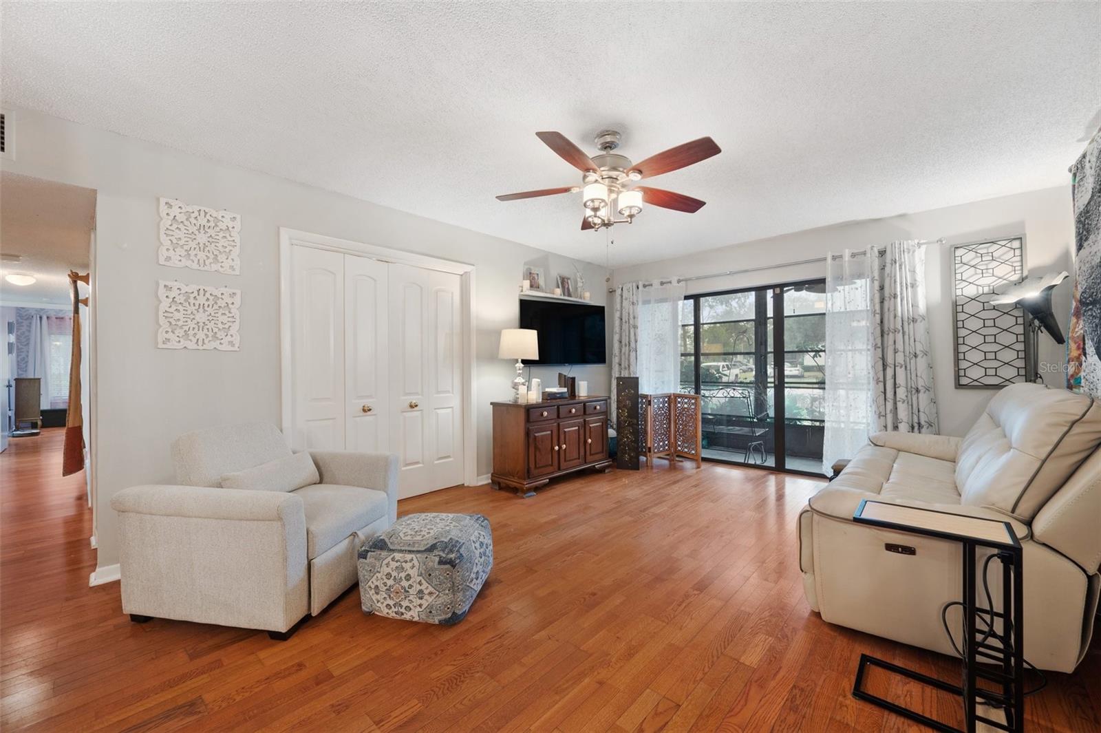 The Living Room opens to the Lanai and to the 3rd Bedroom