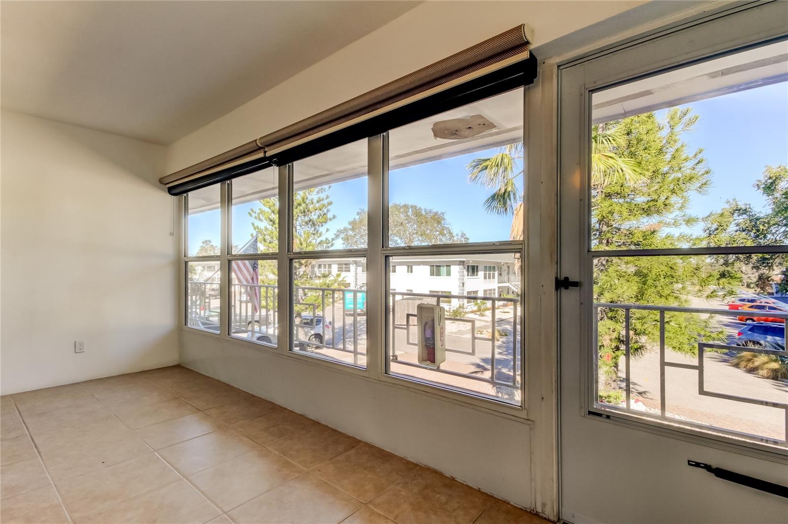 11. There is a NEW Screen Door Exiting Lanai, onto the Open Balcony Used to Access Everyone's Homes