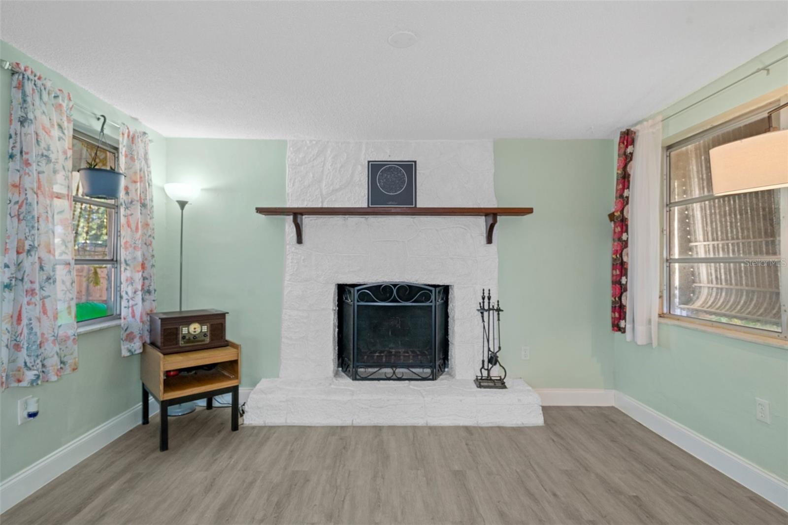 Family Room with Stone Wood Burning Fireplace