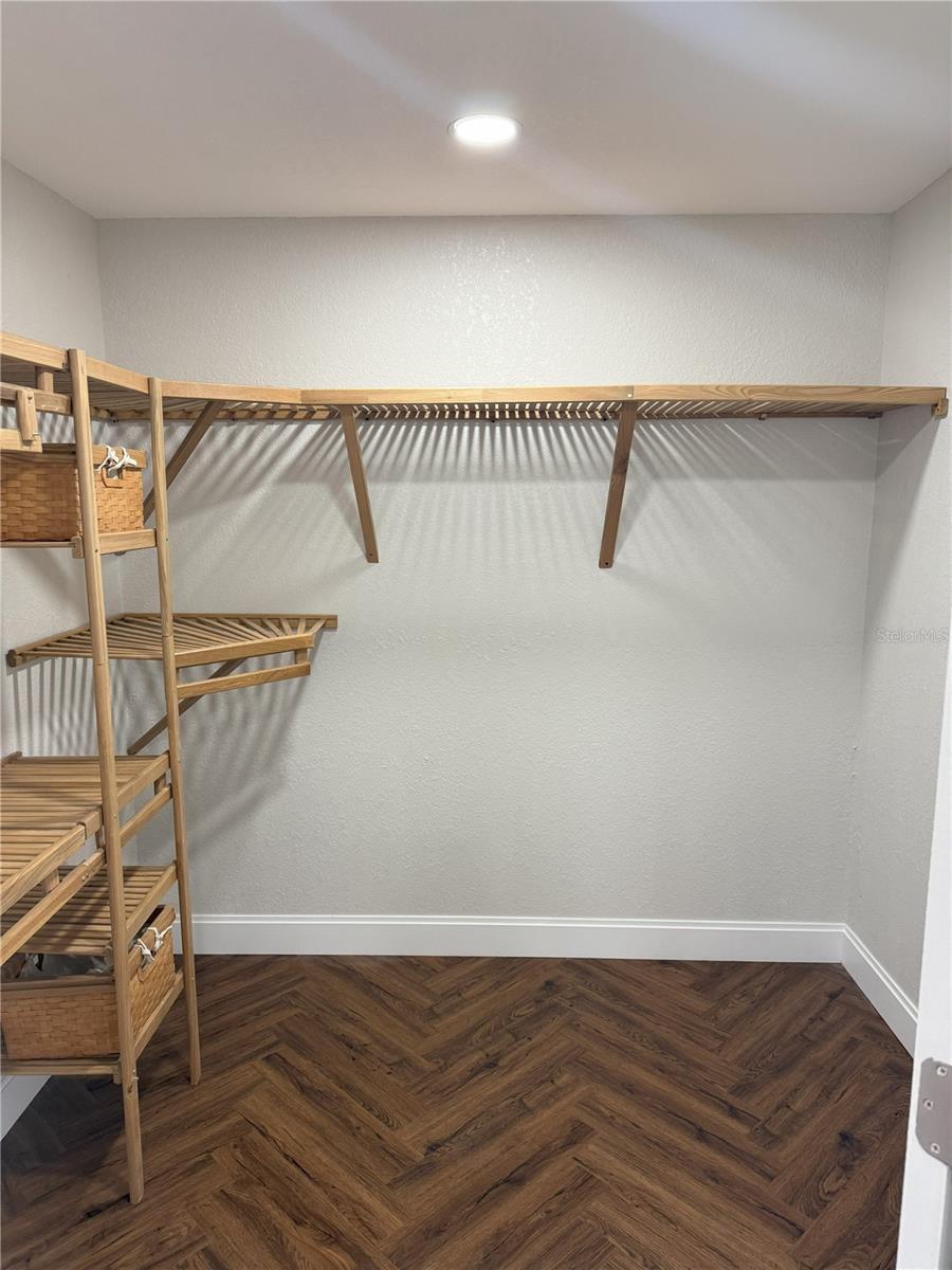 Primary Bedroom Walk in Closet