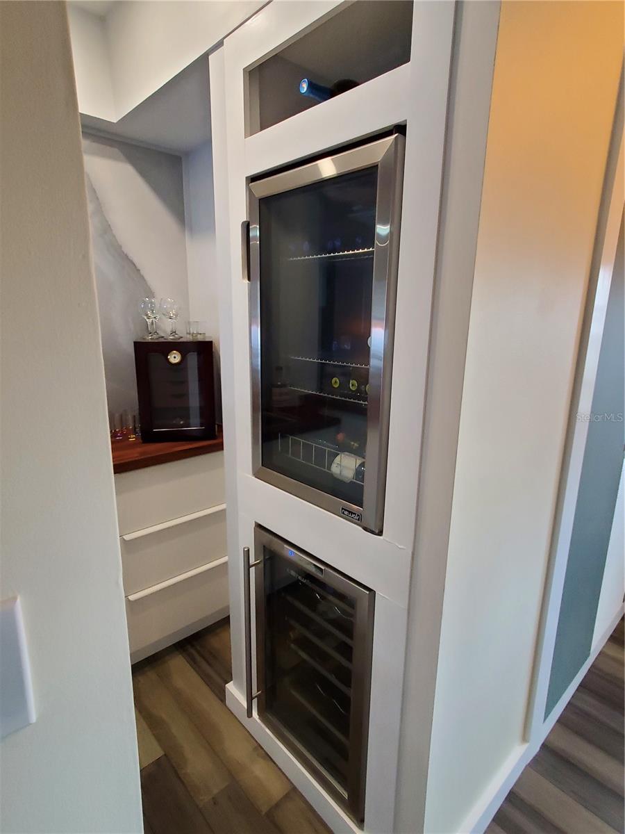 Wine Cooler, Refrig, and Wet sink in Family Room Bar