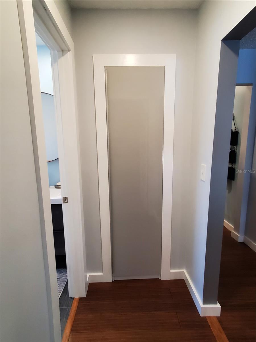 Newly Remodeled Laundry Room. Note the Instant Hot Water Heater on back wall.