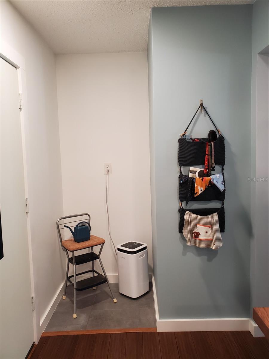 Newly Remodeled Laundry Room. Note the Instant Hot Water Heater on back wall.