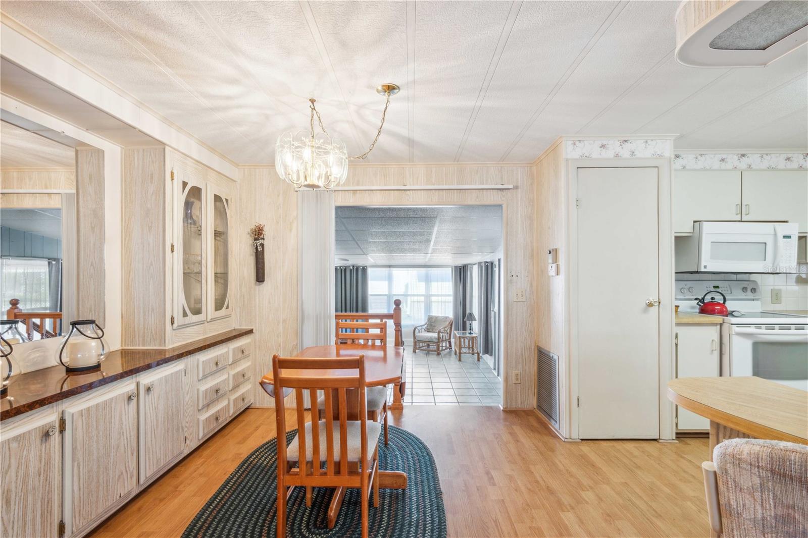 Dining area has built-in storage.