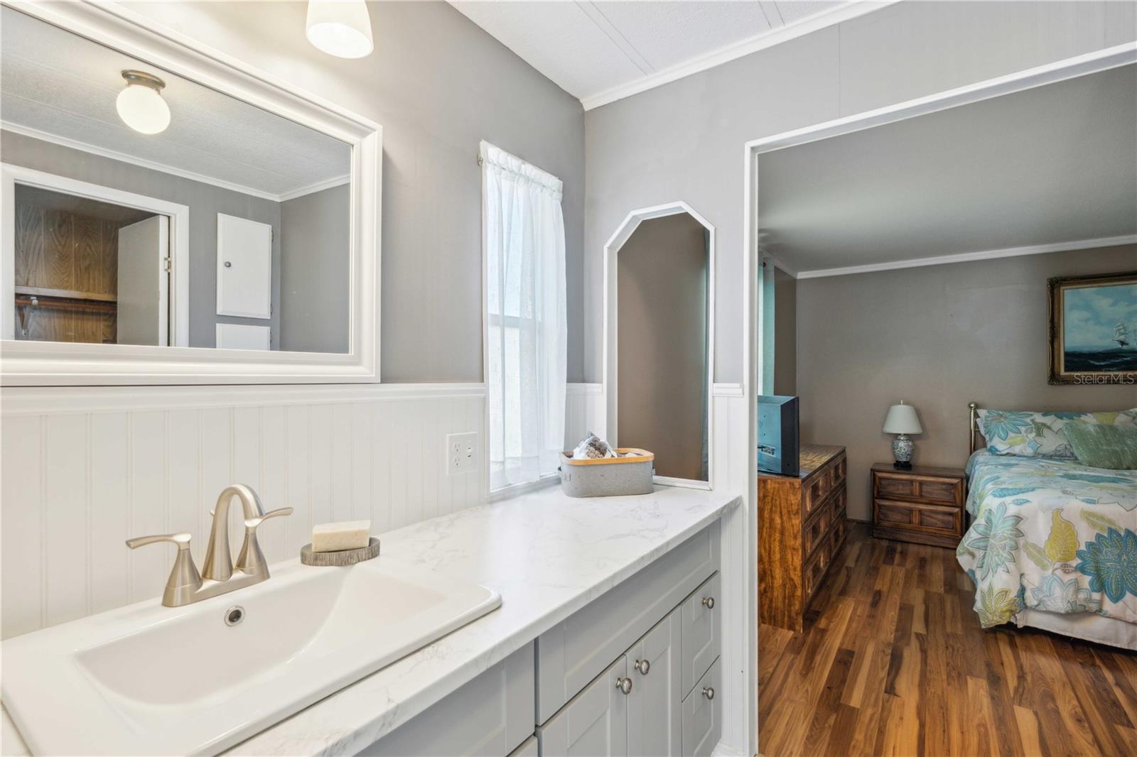 Large walk-in closet in this primary bathroom.