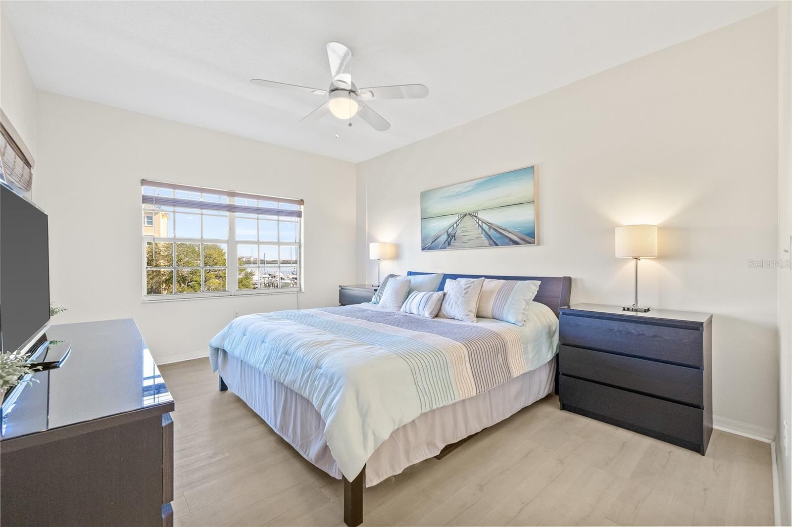 Primary Bedroom with a water view.