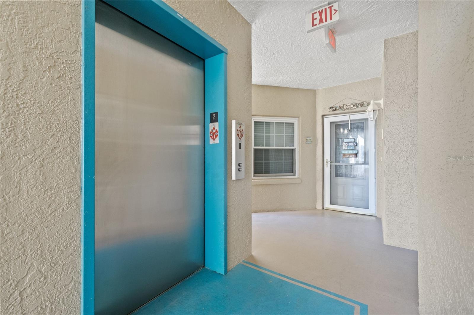 Secured elevators  located down the hall from unit.