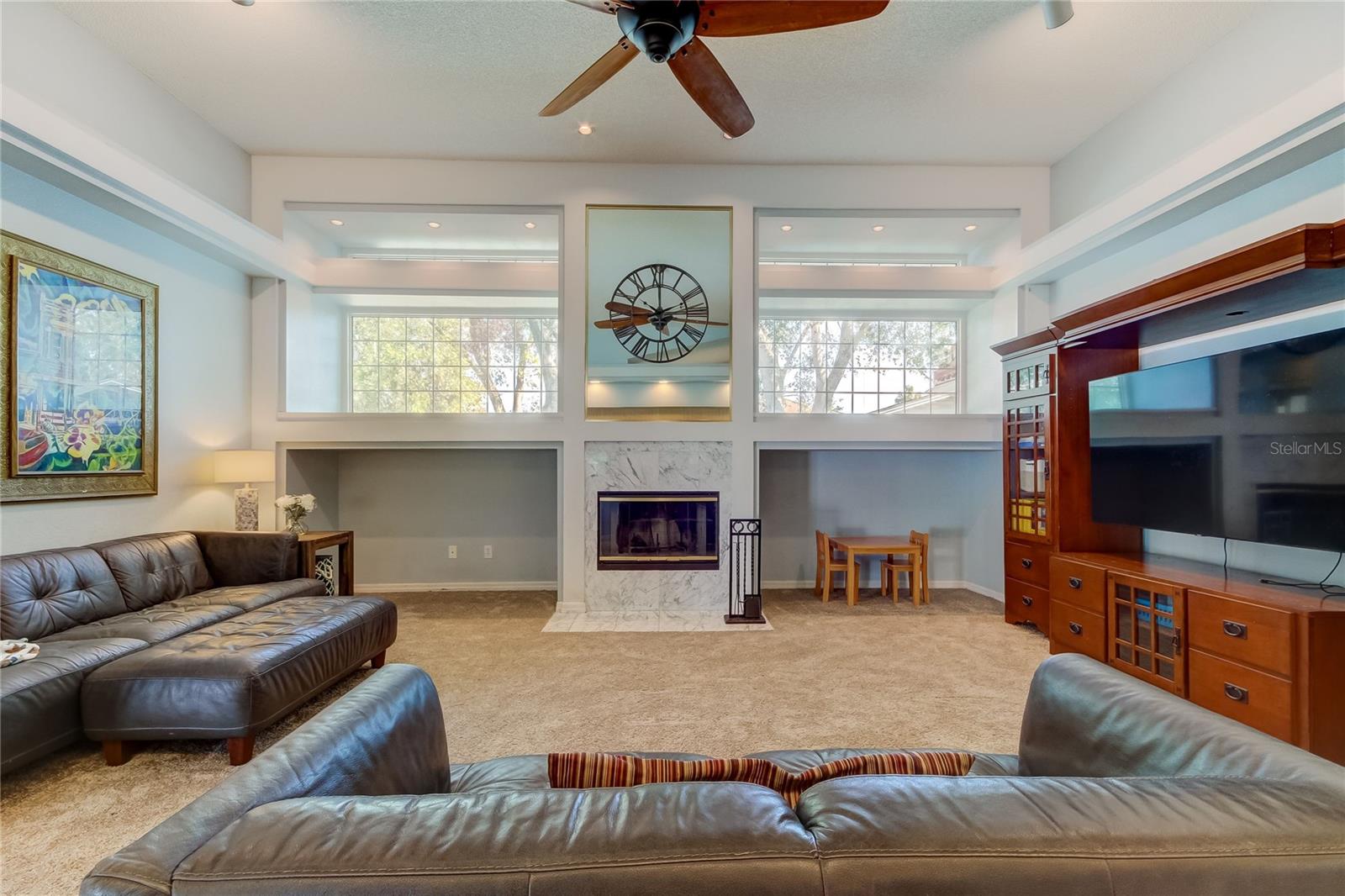 family room with wood burning fireplace