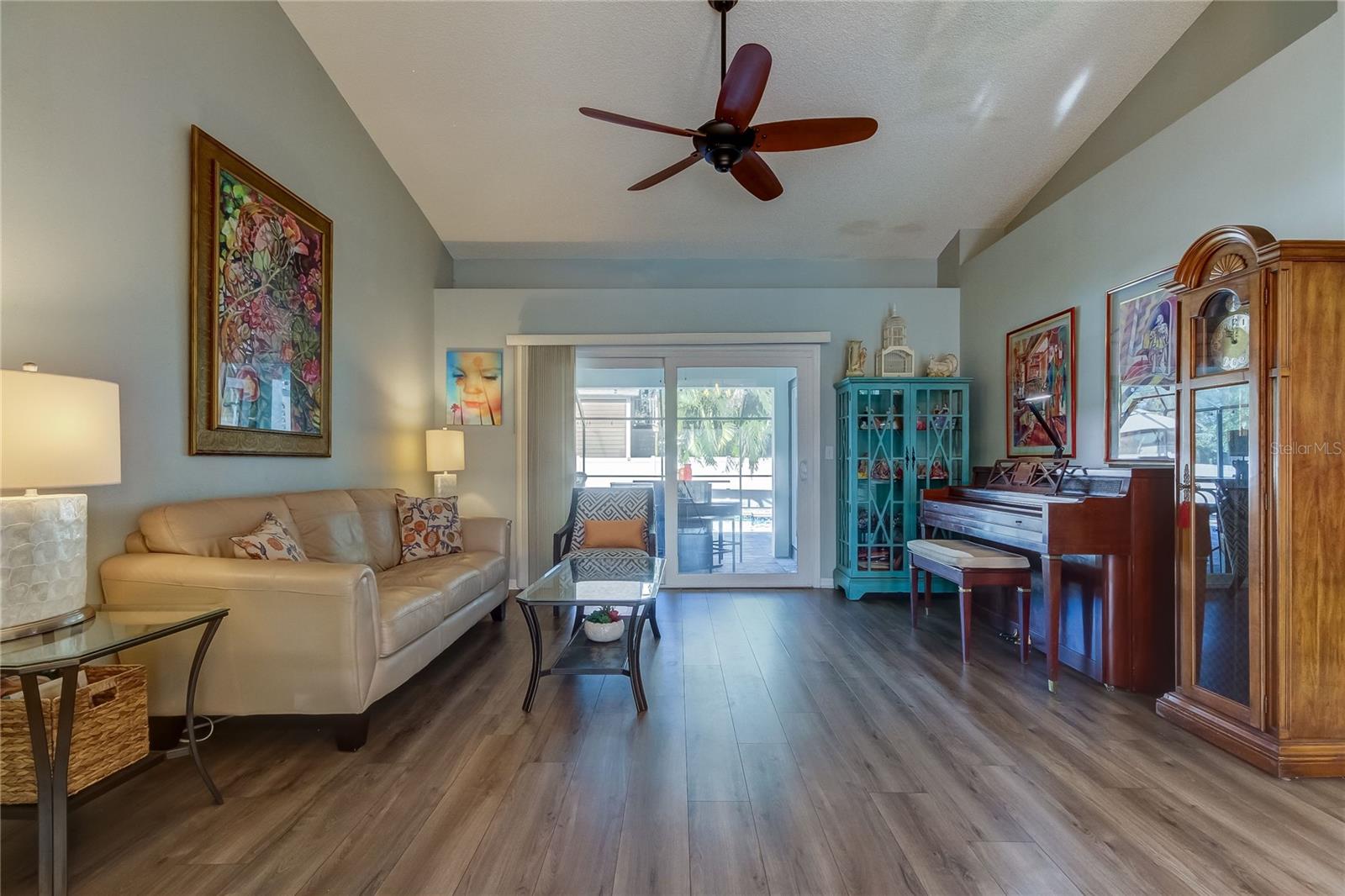 formal living room with sliders to pool deck