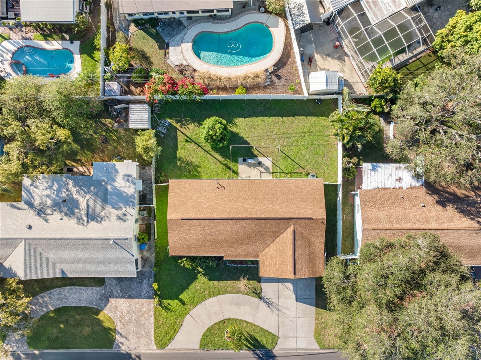 With a 2024 shingle roof, buried service lines, insulated windows, and reclaimed water irrigation, this home is built for comfort and security.