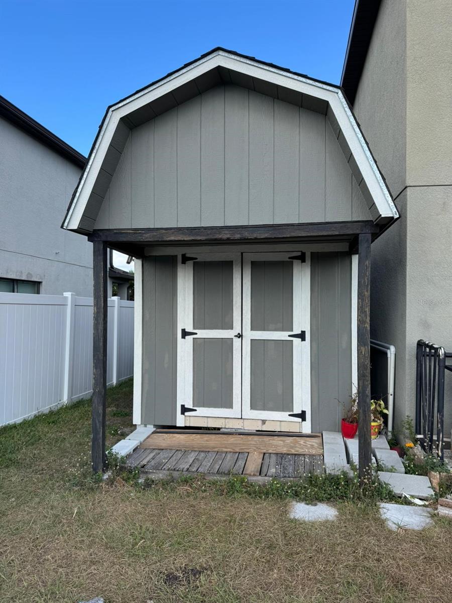 Shed for extra storage or playhouse included