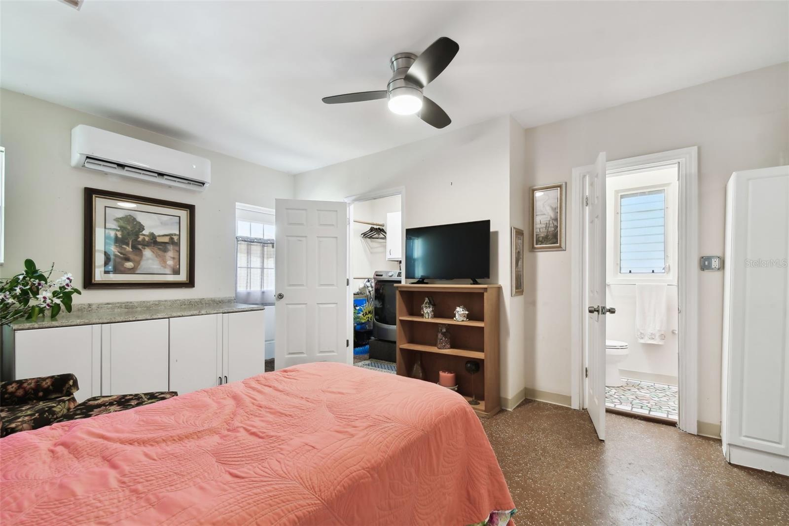 If a standard 2-car garage is important, the partition wall behind the bed can be removed to return to full 2-car garage status.