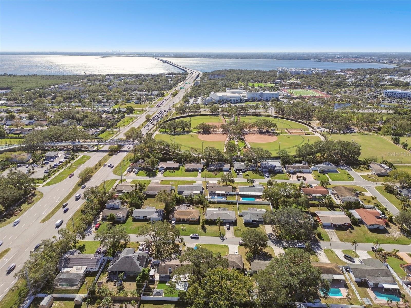 Great location...a short jaunt to the Ream Wilson Trail (Bridge over McMullen Booth) or spend time watching ball at the Eddie C Moore Softball Field or the Chargers Soccer Club. The Bayway Bridge in the distance leads you over to St Pete. Phillies Fan? Spectrum Stadium is just 5 minutes away!