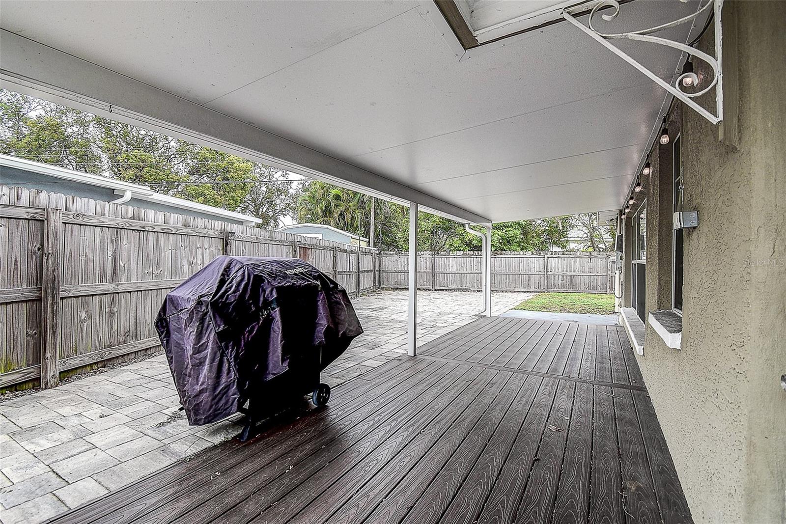 Large covered deck & decorative outdoor light