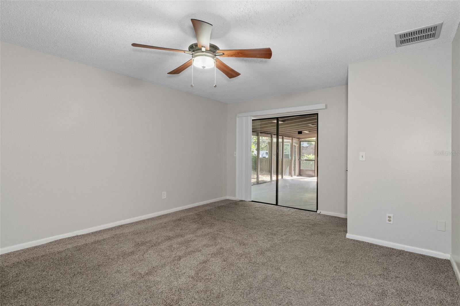 Primary Bedroom with access to patio