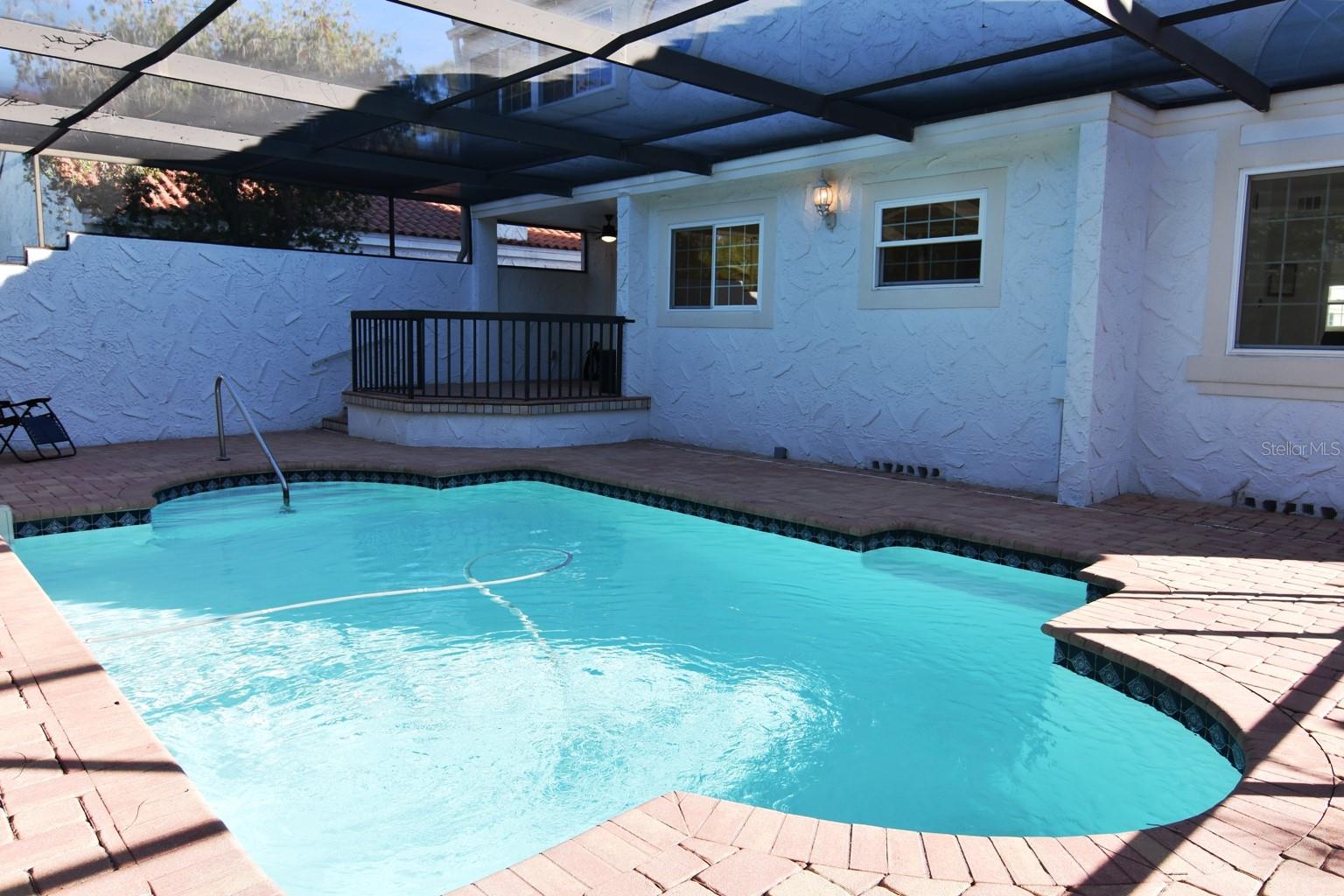 Pool view of house