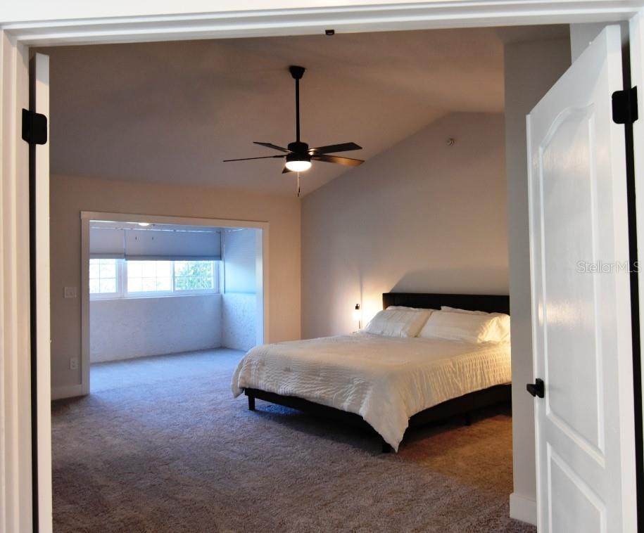 Primary bedroom upstairs with sitting room