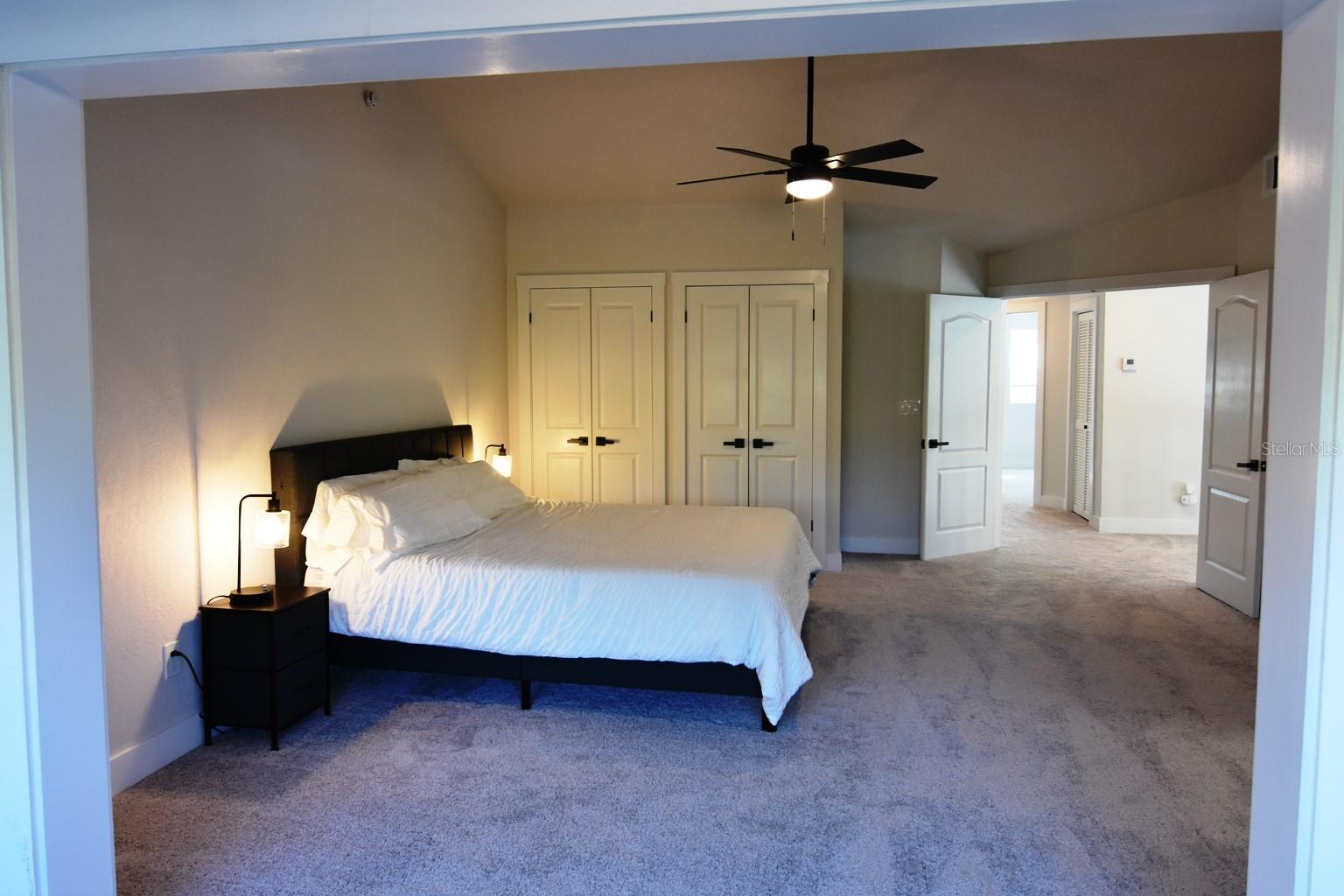 View of primary bedroom upstairs  from sitting room