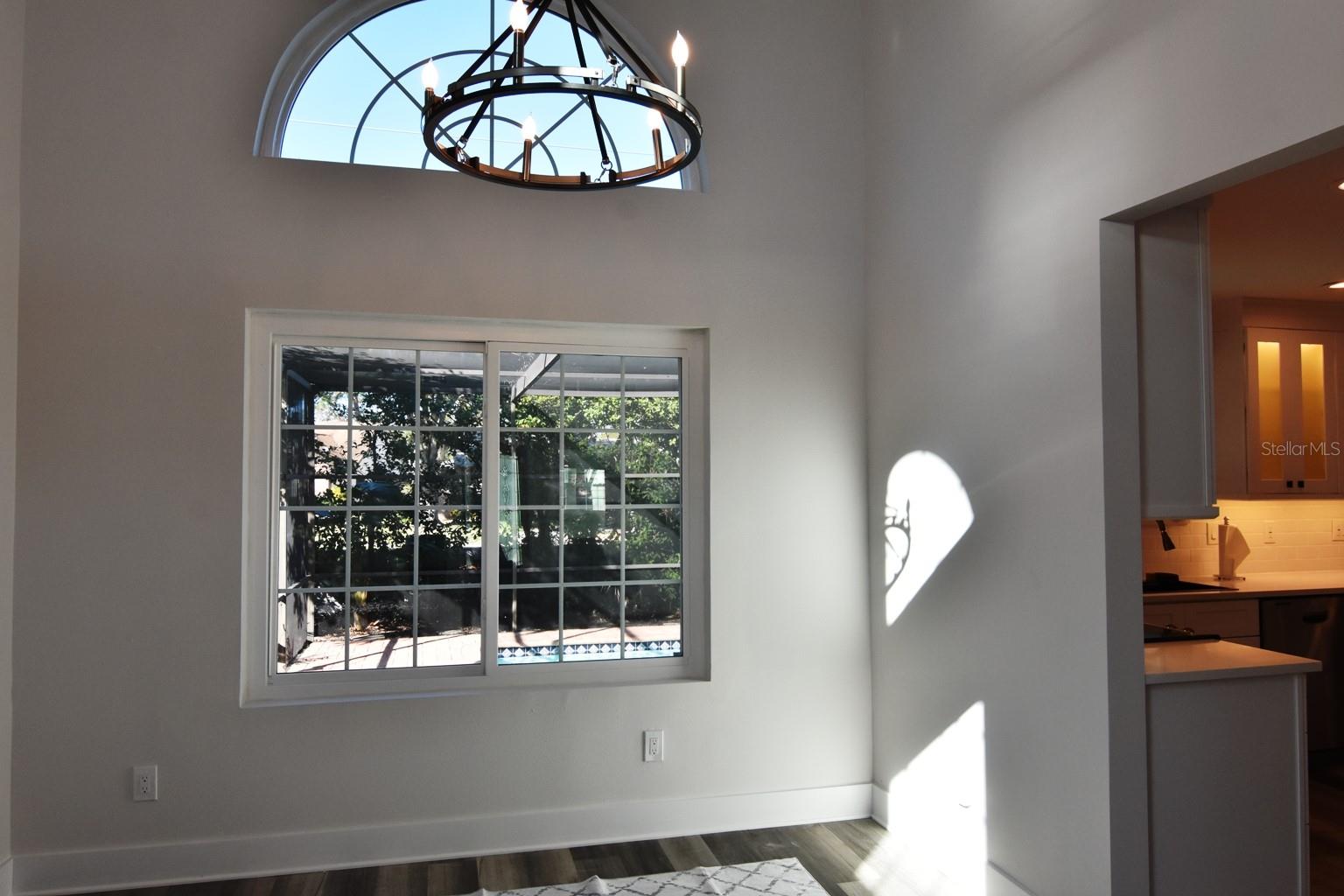 Formal dining room opens to kitchen