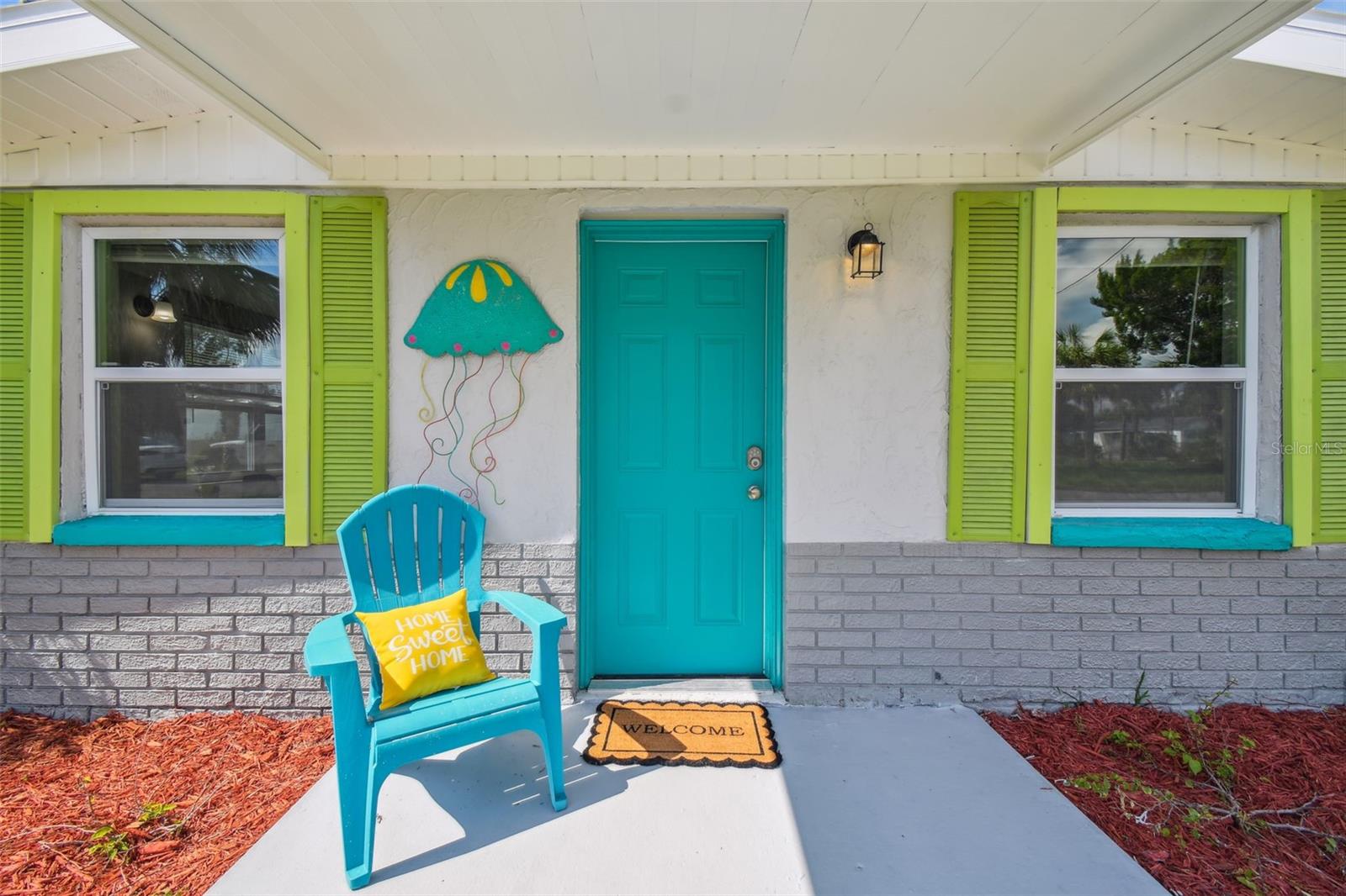 August 2024 newly painted front porch and new shutters