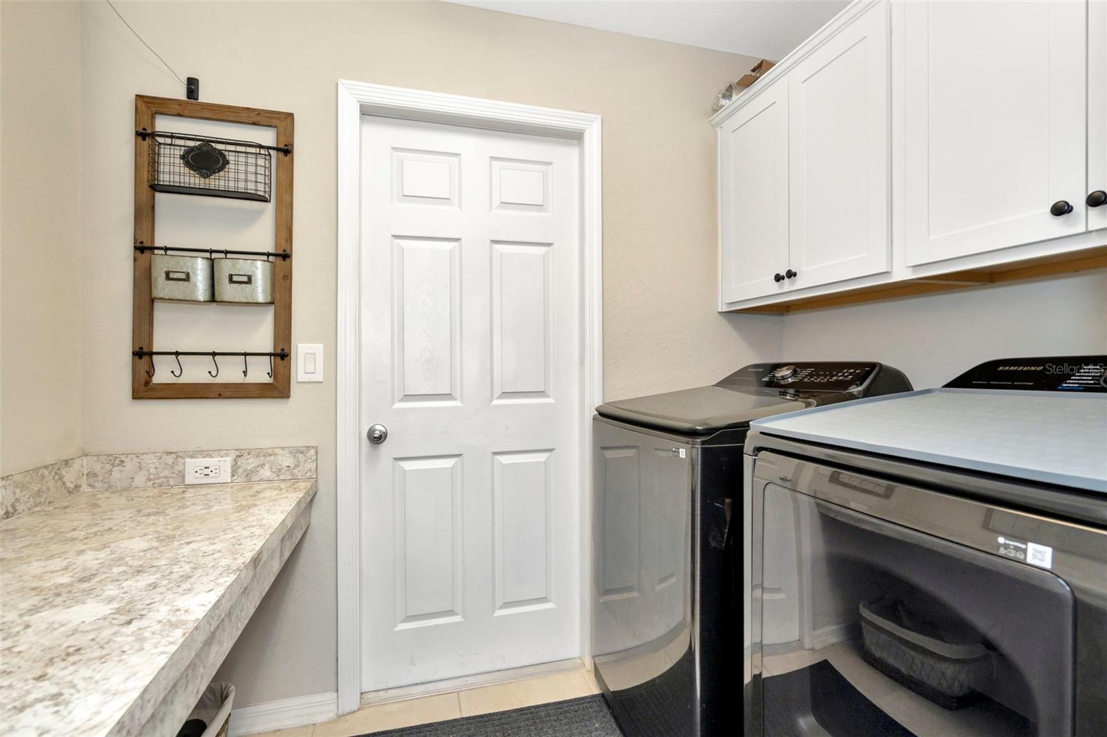 Laundry and door to garage