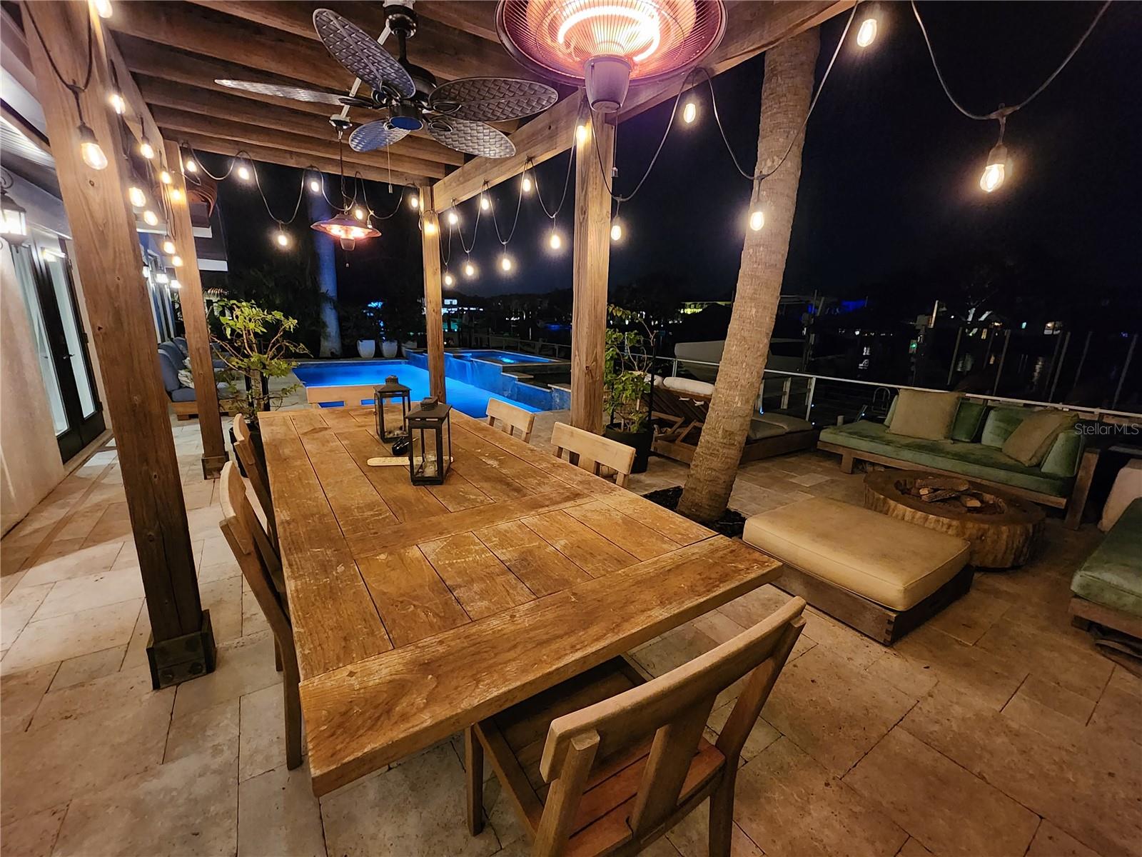 Rear patio pergola at night gor outdoor entertaining