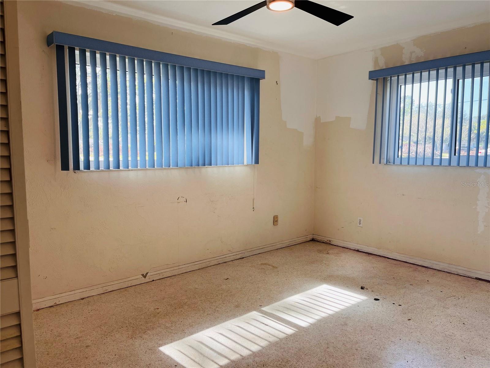 Bedroom 3 with terrazzo floors