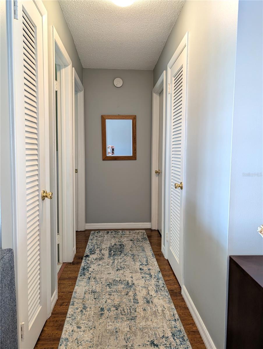 Bedroom Hallway:  Linen closet on left, then Guest Bathroom, then Guest Bedroom.  Storage closet on right, then Master Bedroom