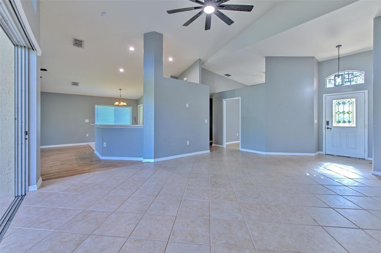 Family room flowing into kitchen area.