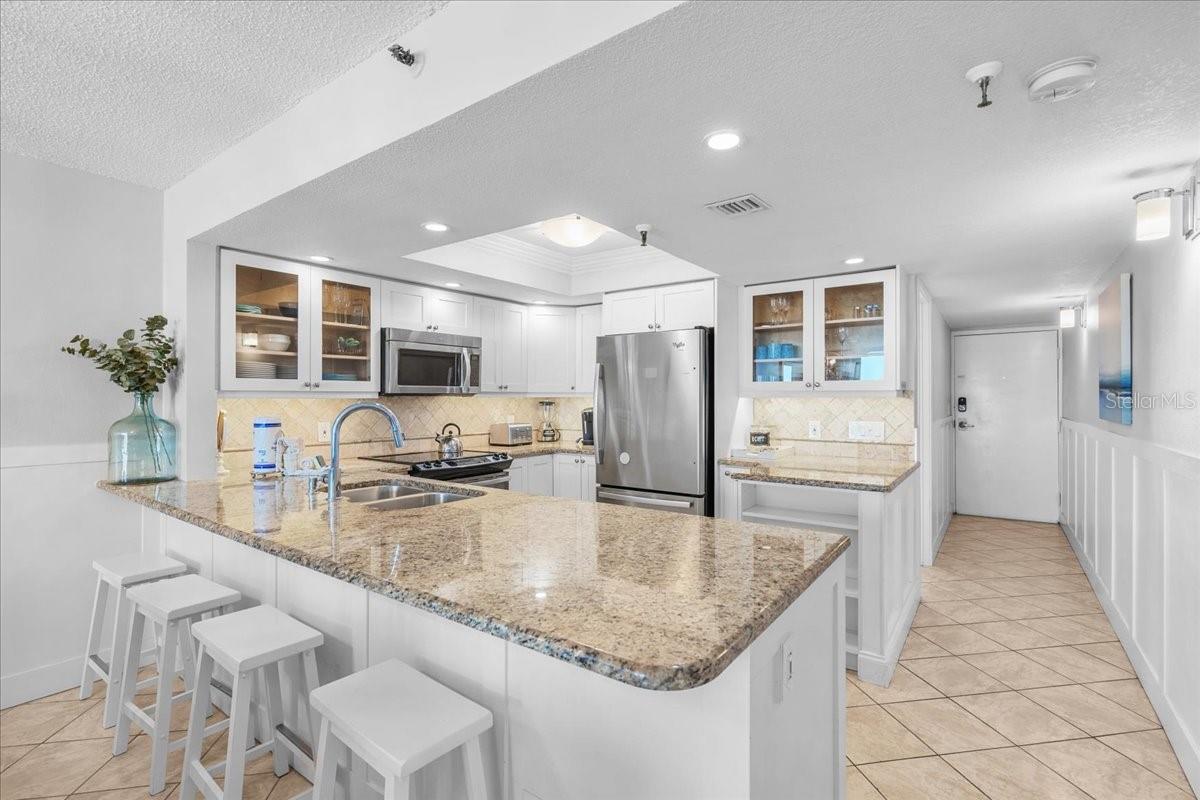 Plenty of counter space includes breakfast bar