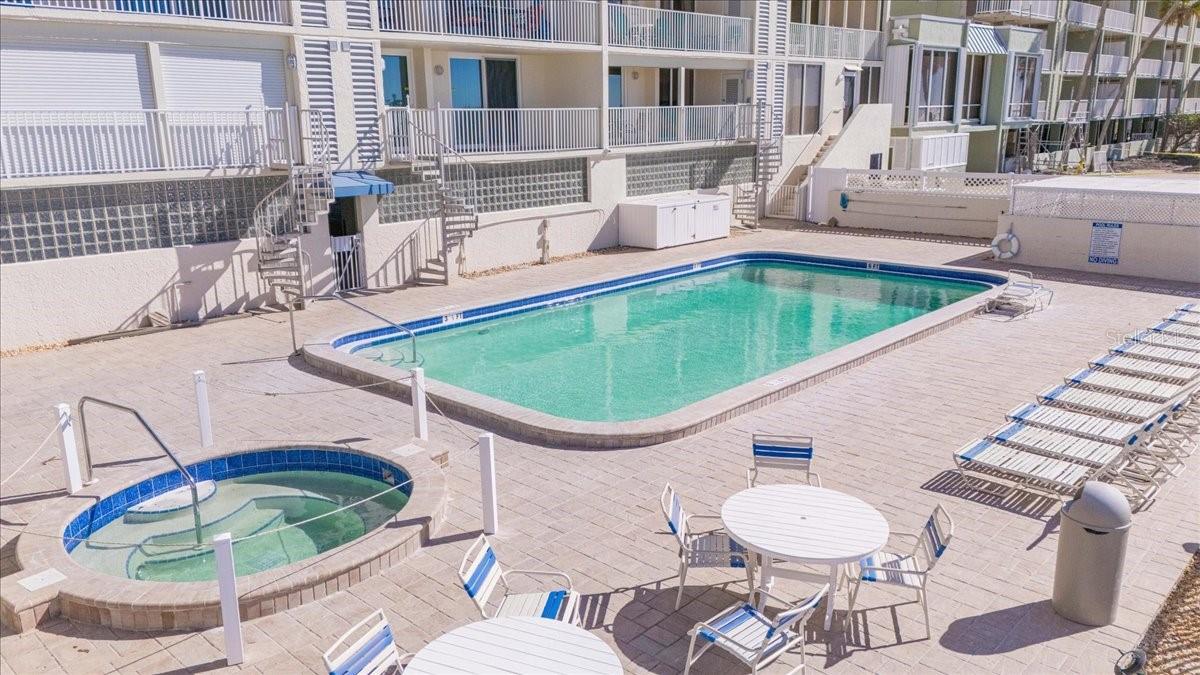 Lots of seating around the pool that faces the gulf and beaches