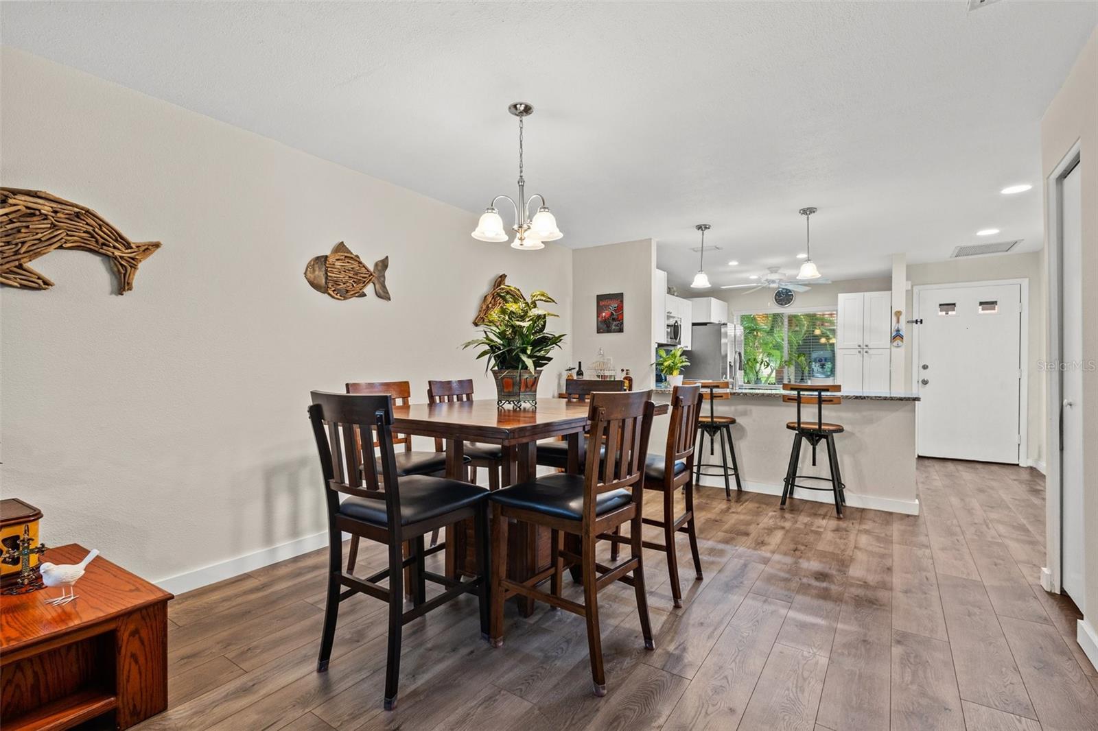 Dining room area is spacious enough to accommodate a large dining table for family gatherings.