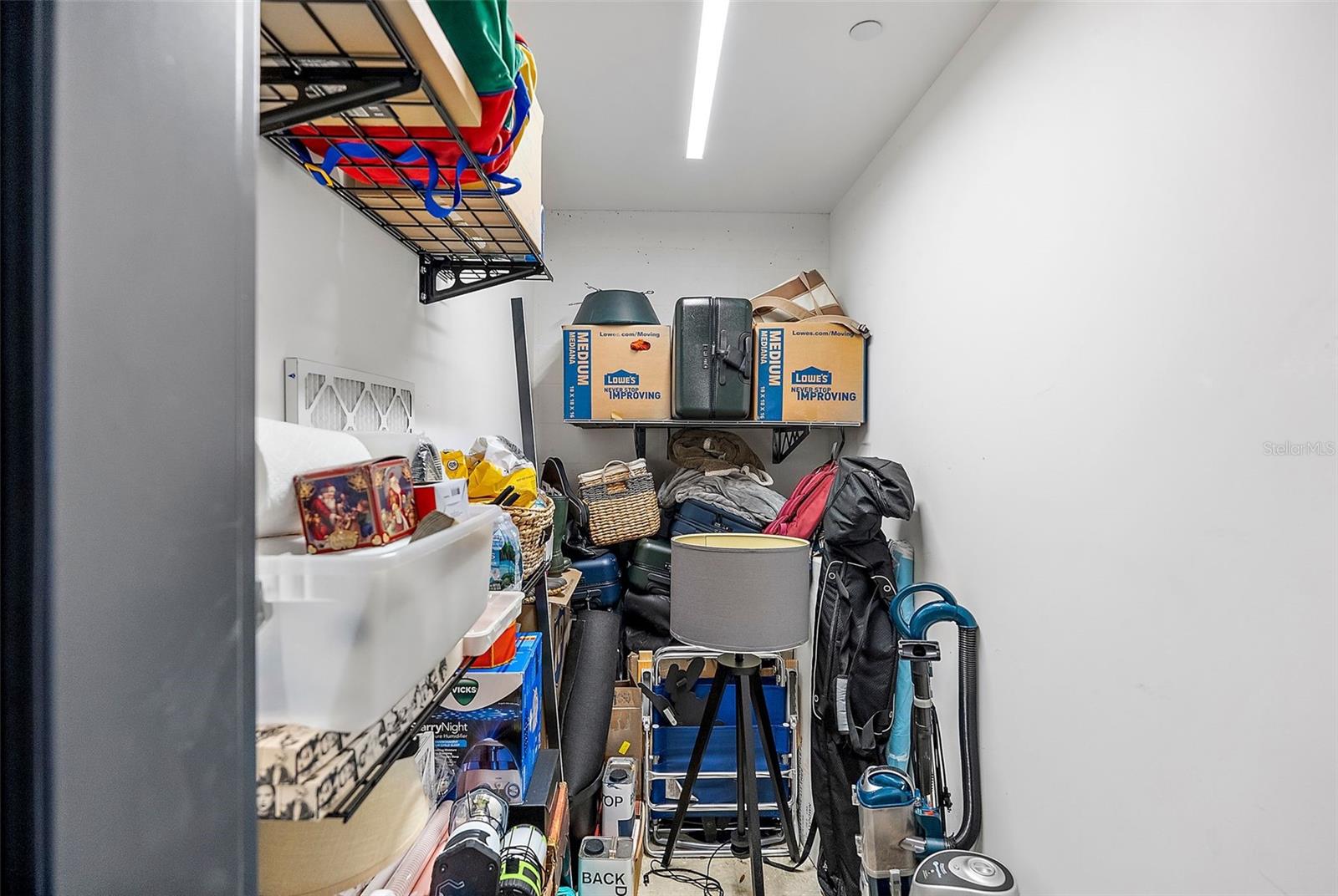 Custom wire shelving in the storage closet located in thehallway (this storage closet is spacious and located on thesame floor as the unit)