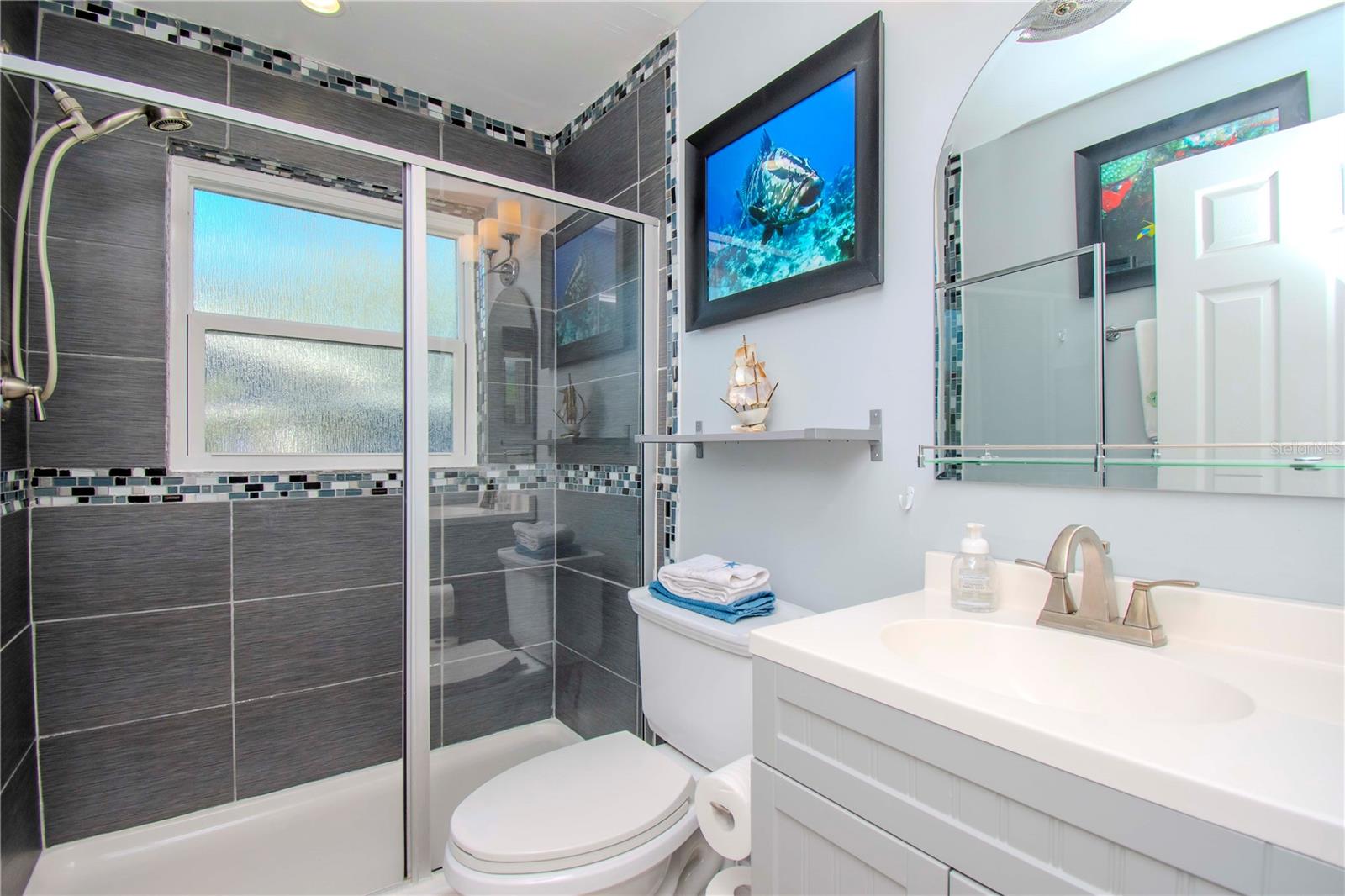 2nd Bathroom with updated shower and vanity.