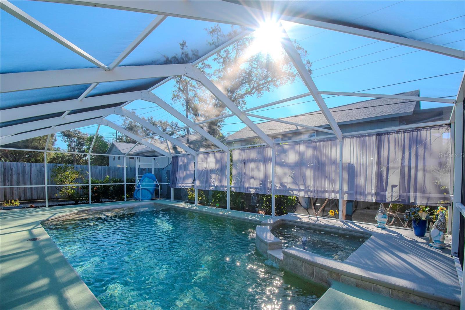 Another view of the pool and jacuzzi