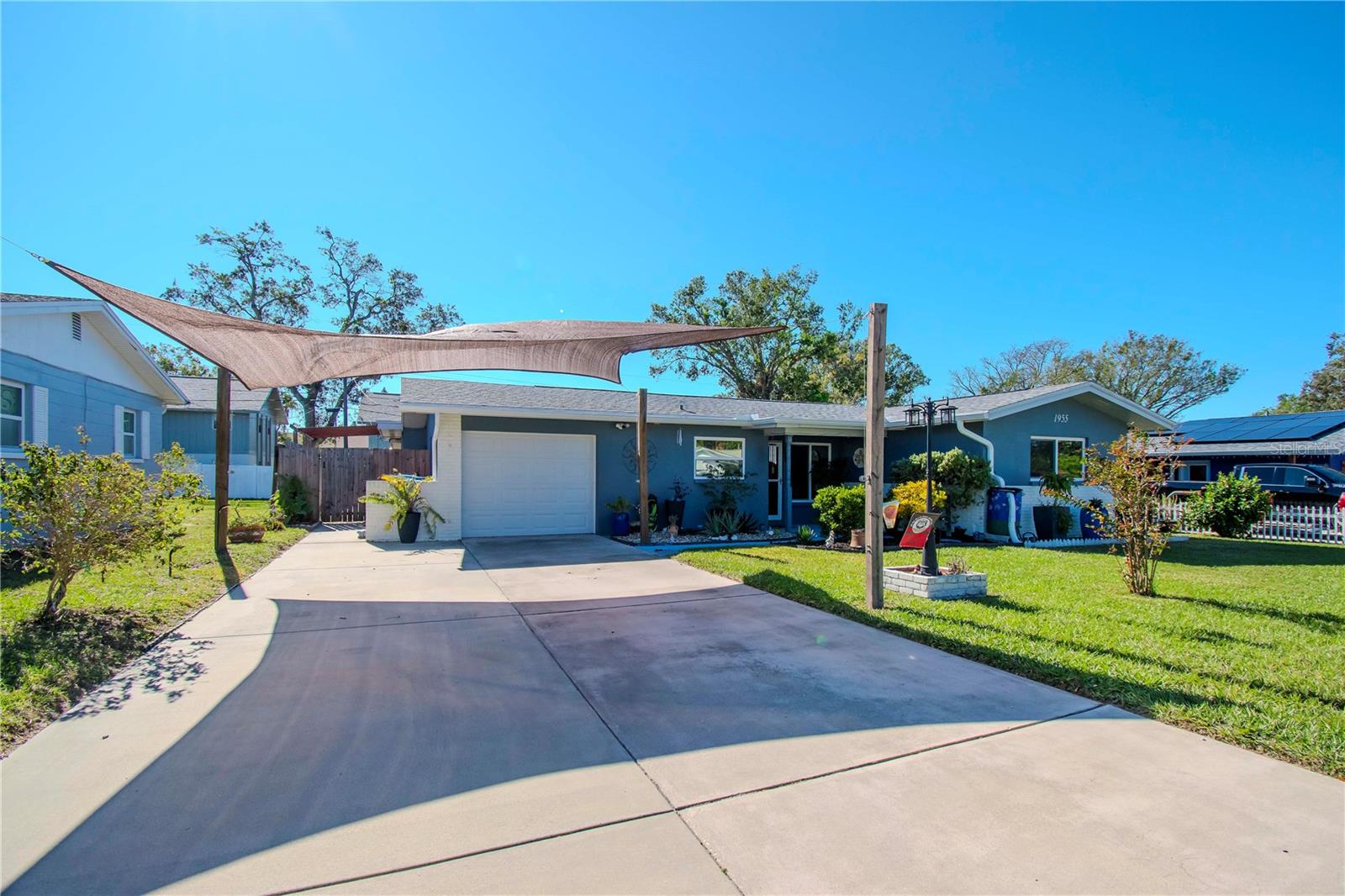 View of the extra large driveway with the shade