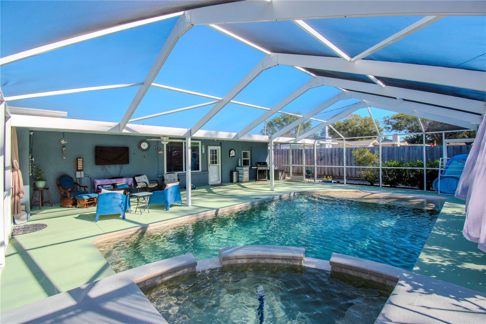 View of pool and jacuzzi