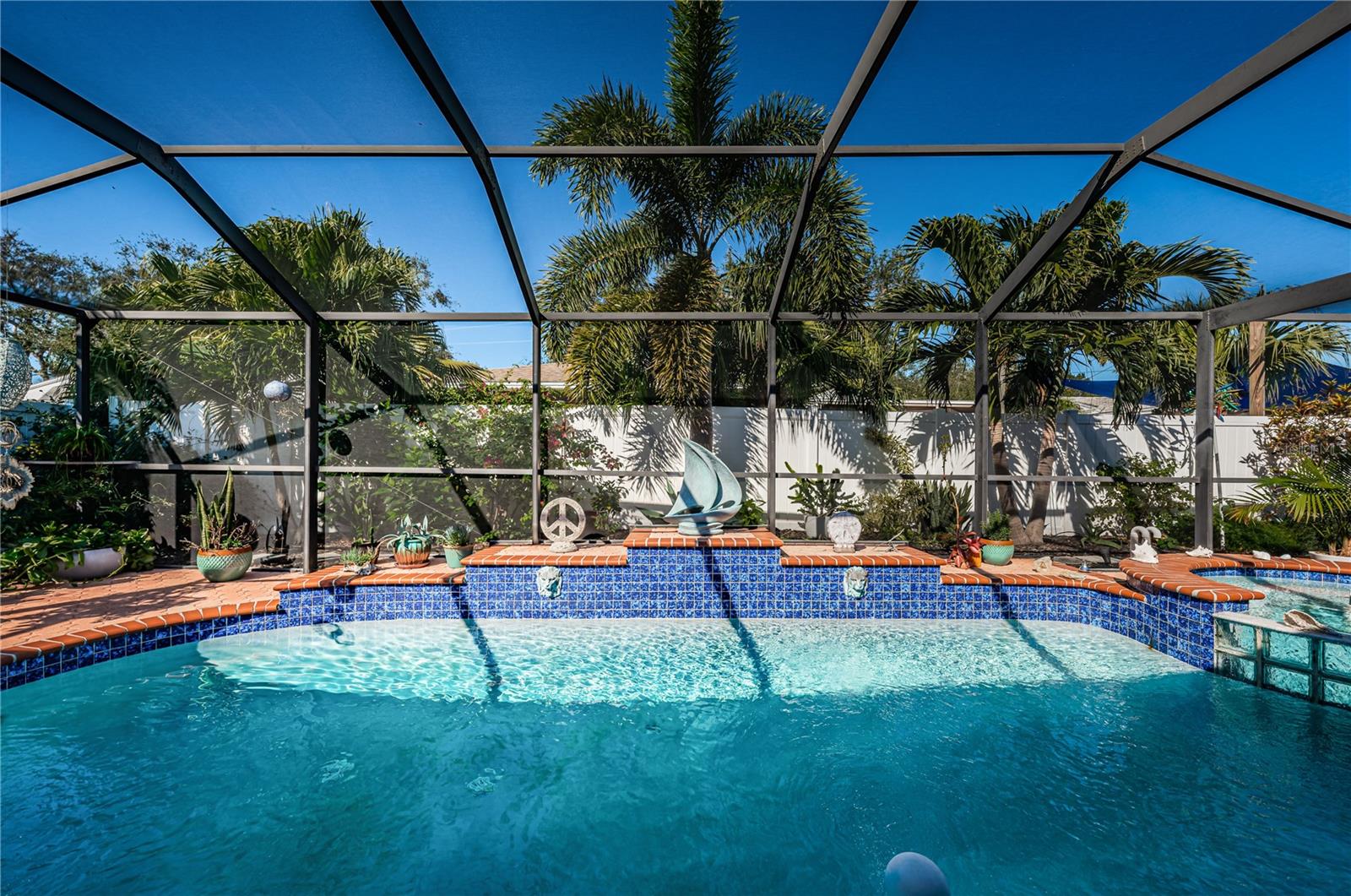 Fountains Spray from Lion Heads on Side Of Pool