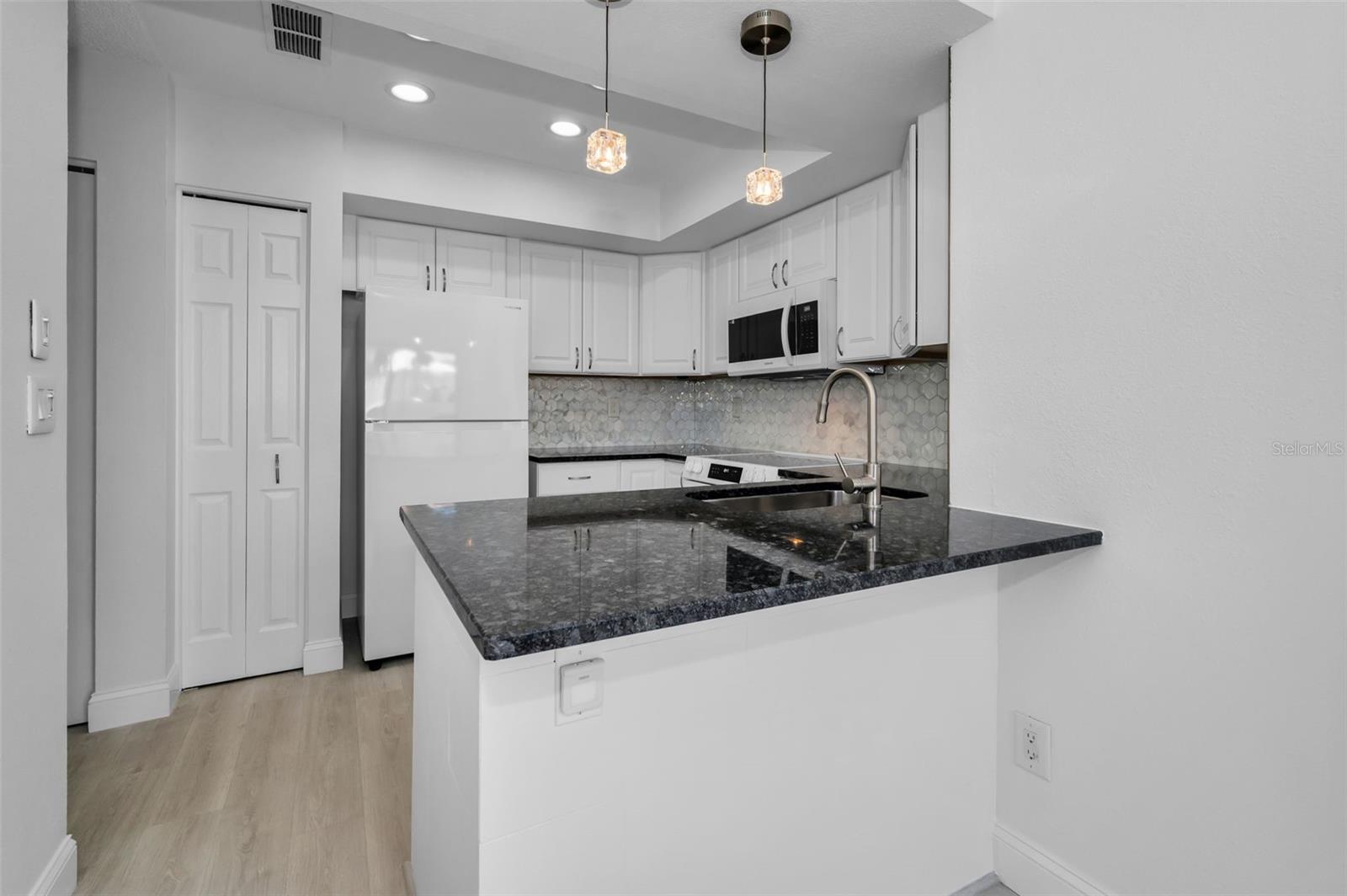 Updated kitchen with granite counters