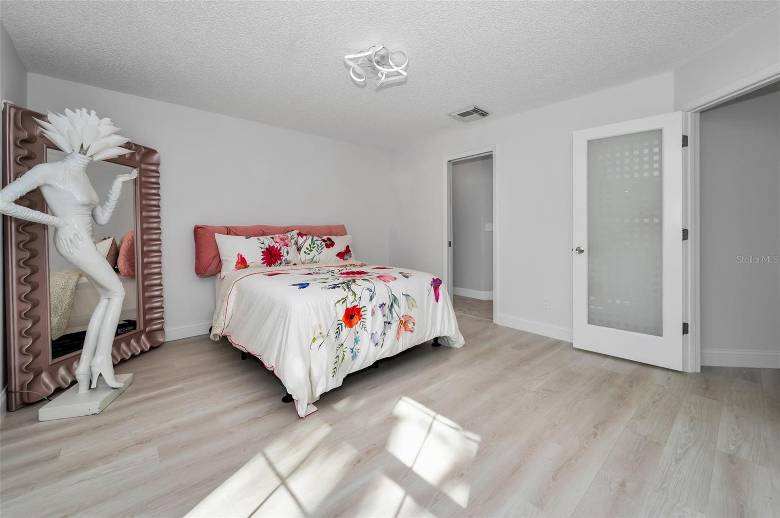 Primary bedroom with en-suite bath