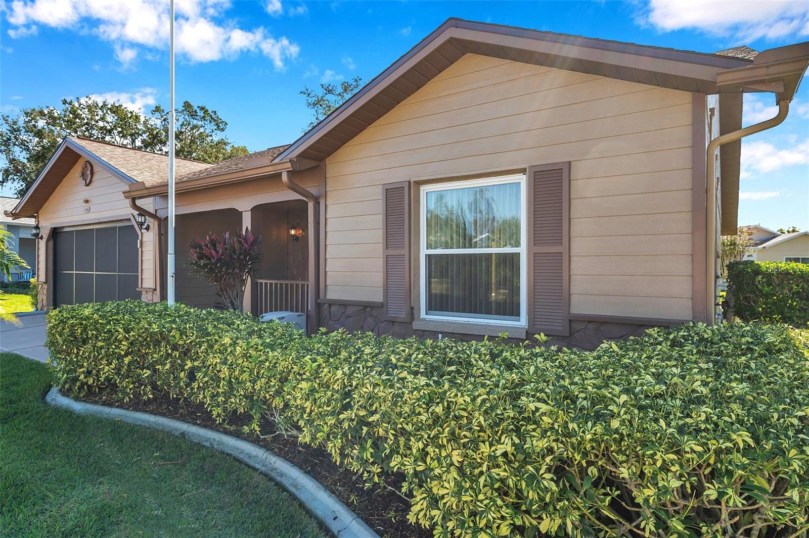 View of home with concrete edge curbing