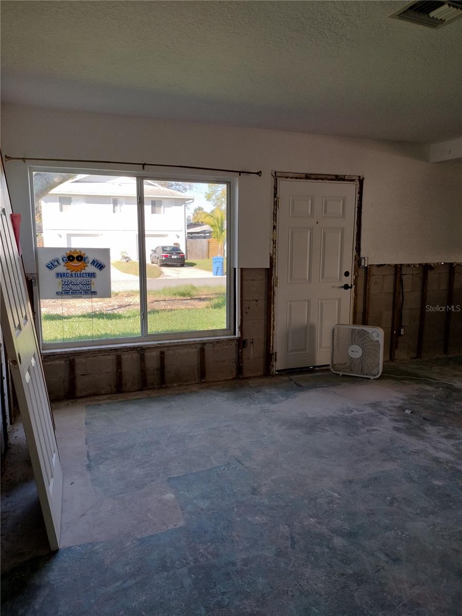 View of living room looking at front windows