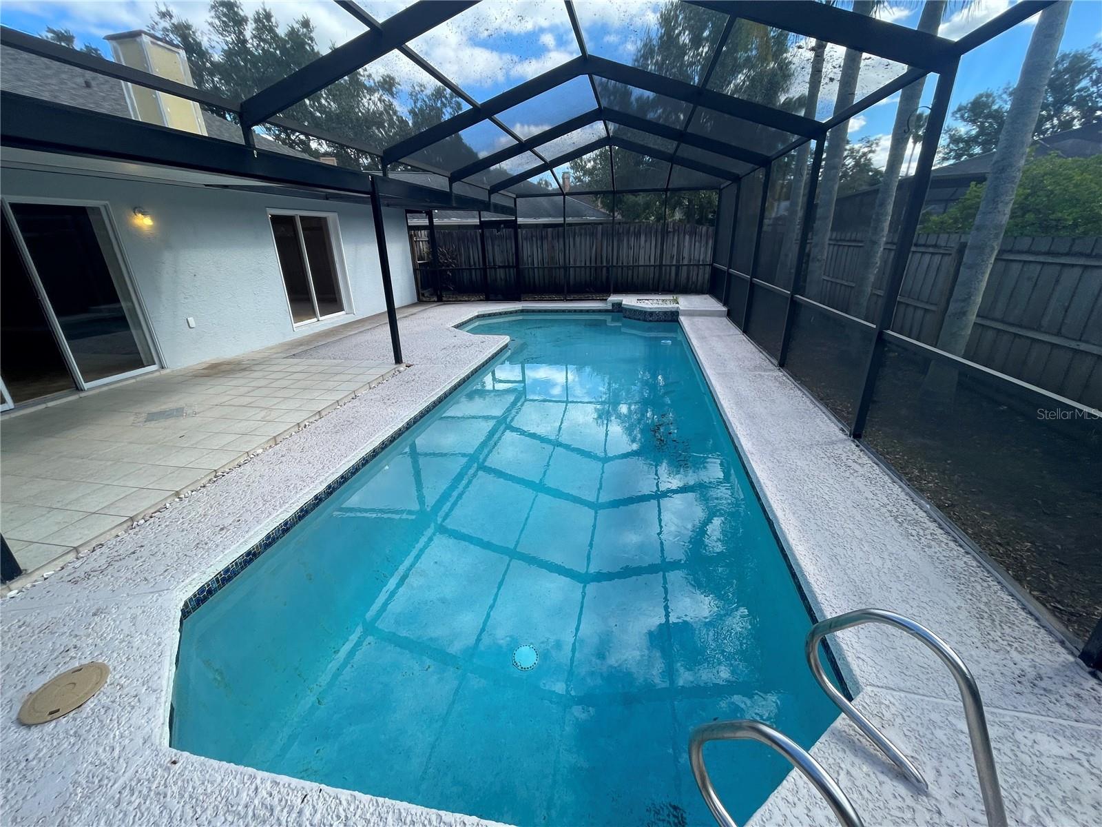 fully fenced yard and pool