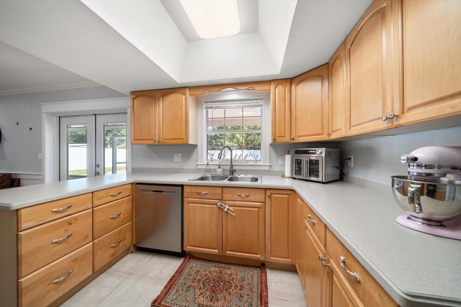 Lots of space in this fully equipped kitchen which adjoins the family room area.