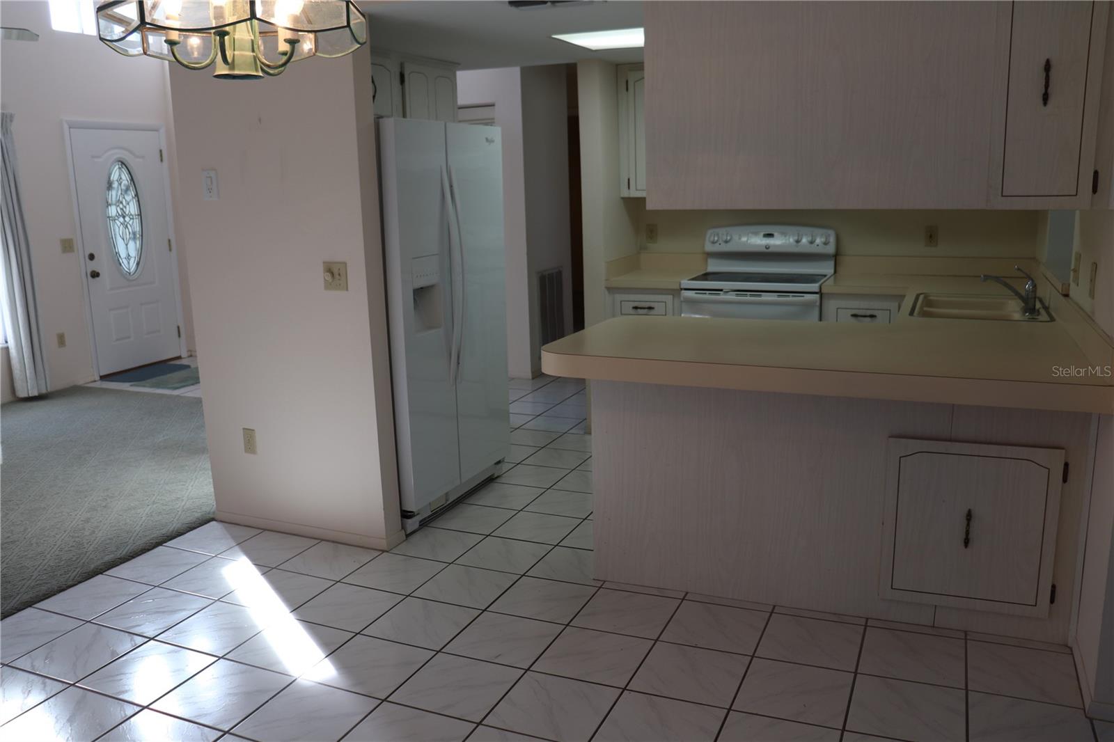 KITCHEN THROUGH DINING ROOM