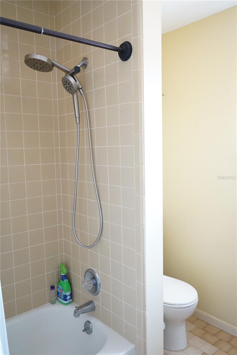 hall bath has tub shower