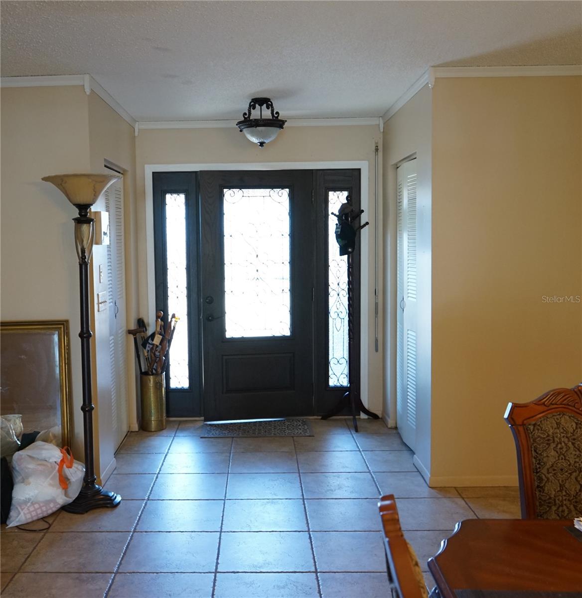 entry with glass door and foyer