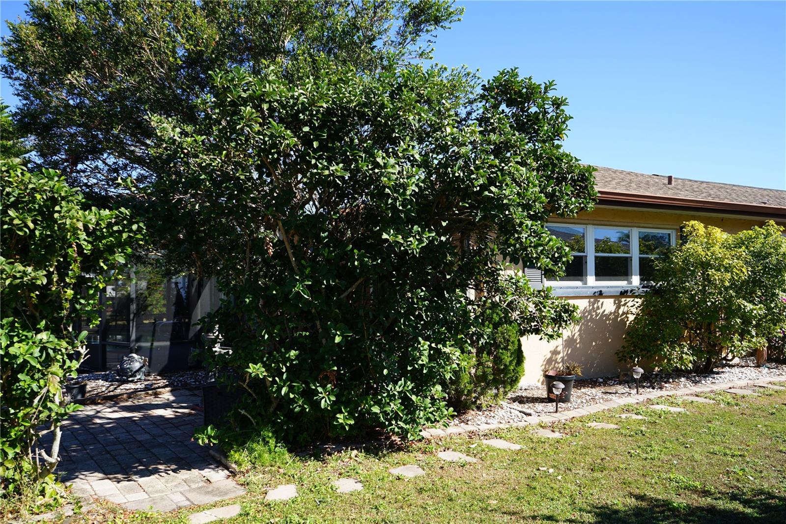 side of home has entrance to pool area